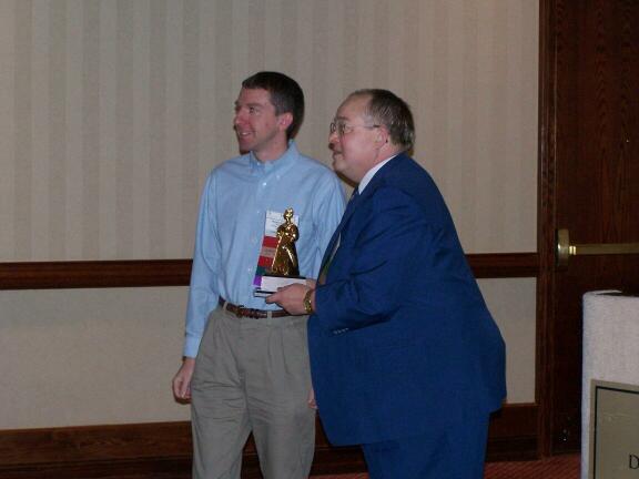 Currie Colket presents SIGAda Distinguished Service Award to Martin Carlisle