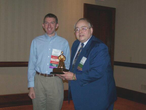 Currie Colket presents SIGAda Distinguished Service Award to Martin Carlisle