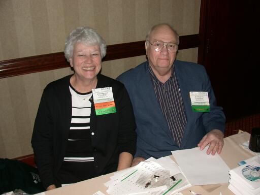Anne Morrison and J.C. Morrison at the Registration Desk