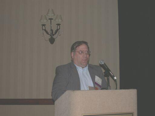 Rick Conn introducing Pam Thompson, Keynote Speaker