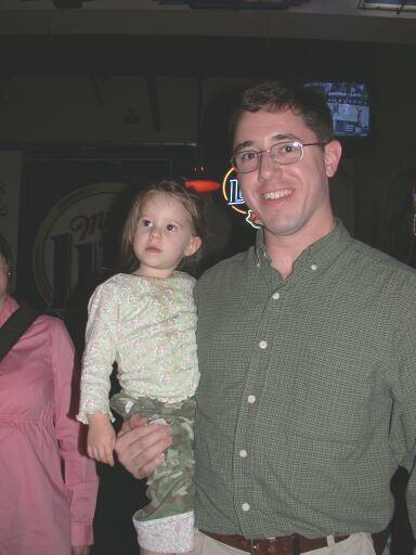 Reilley Davis being held by her father, Jim Davis