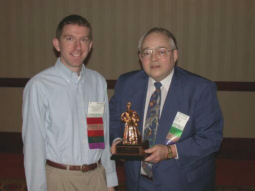 Currie Colket presents SIGAda Distinguished Service Award to Martin Carlisle