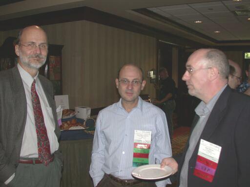 Erhard Ploedereder, Jean-Pierre Rosen, and Alan Burns at a break