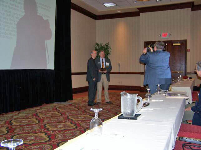 John McCormick presents the Outstanding Ada Community Contributions Award to Pascal Leroy