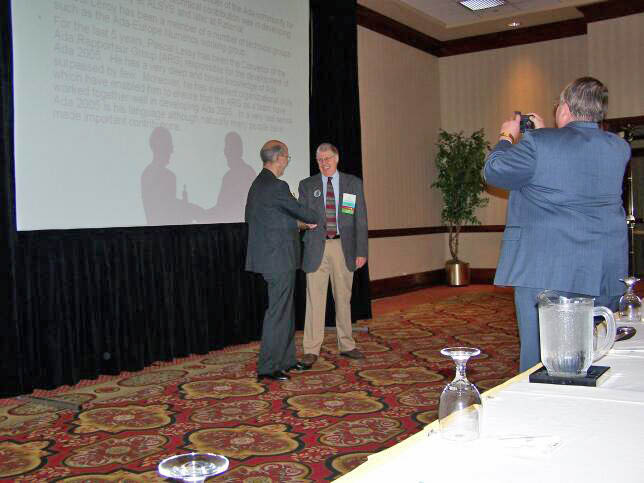 John McCormick presents the Outstanding Ada Community Contributions Award to Pascal Leroy