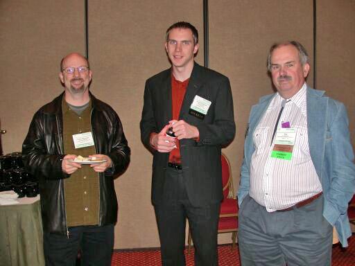Charles Reynolds, Knut Pedersen, and S. Ron Oliver in the vendor area