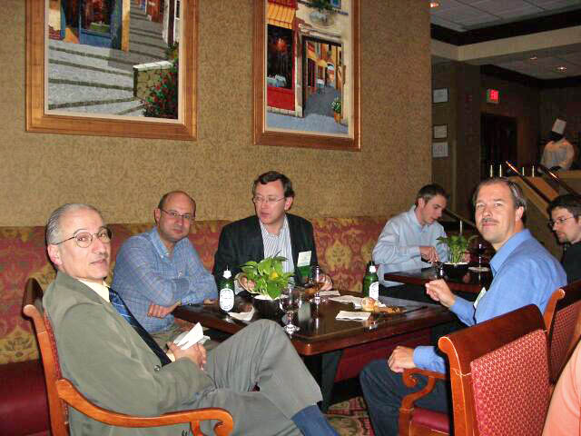 Ed Schonberg, Jean-Paul Rosen, Dirk Craeynest, and Rob Veenker (bright blue shirt)