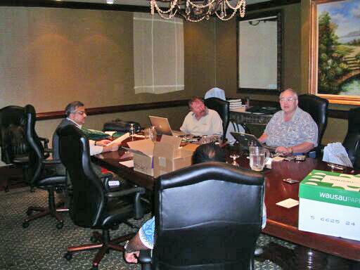 Alok Srivastava, Hal Hart, and Currie Colket making pre-conference preparations