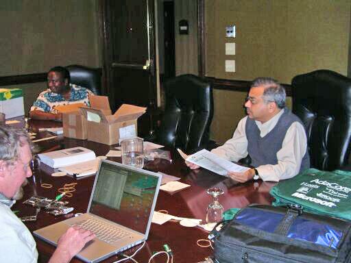 Hal Hart, Eugene Bingue, and Alok Srivastava in the pre-conference preparations room