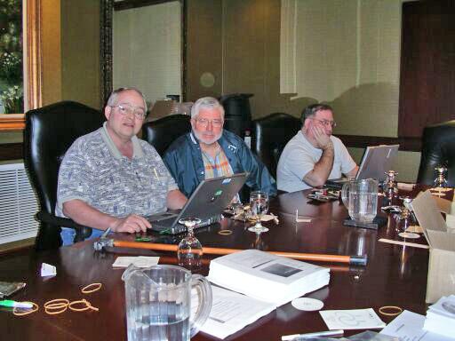 Currie Colket, Tom Panfil, and Rick Conn in the pre-conference preparations room