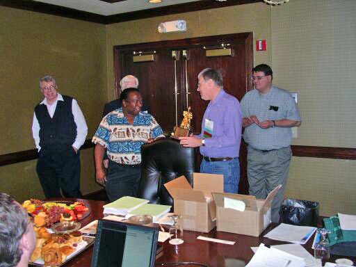 John McCormick presents Eugene Bingue his SIGAda Distinguished Service Award<br>Clyde Roby, Eugene, John, and David Cook