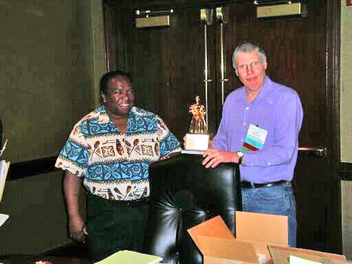 Eugene Bingue and John McCormick with Lady Ada statuette