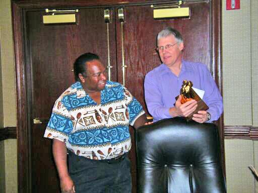 Eugene Bingue and John McCormick with Lady Ada statuette